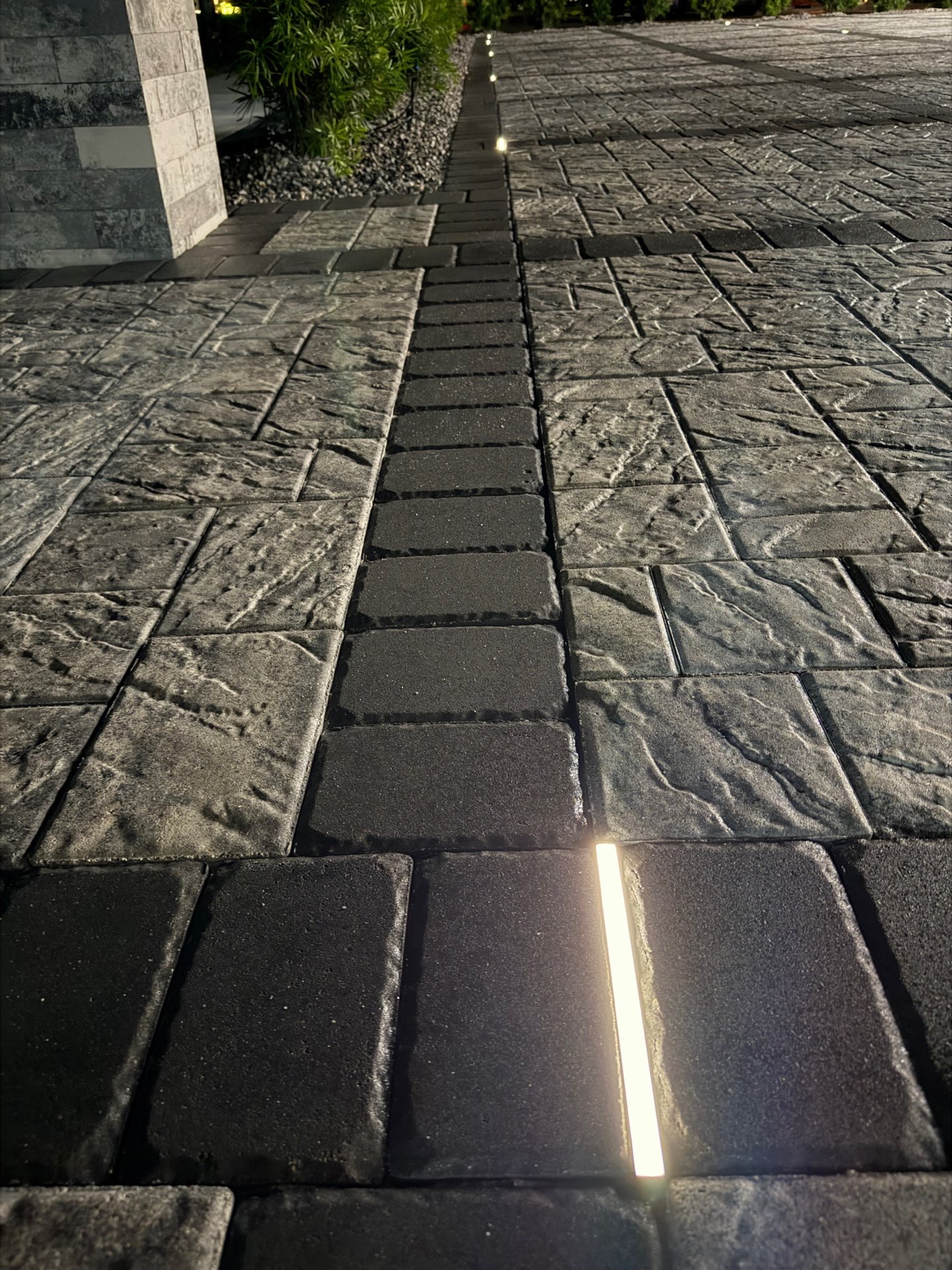 Detail of paver driveway with embedded LED strip