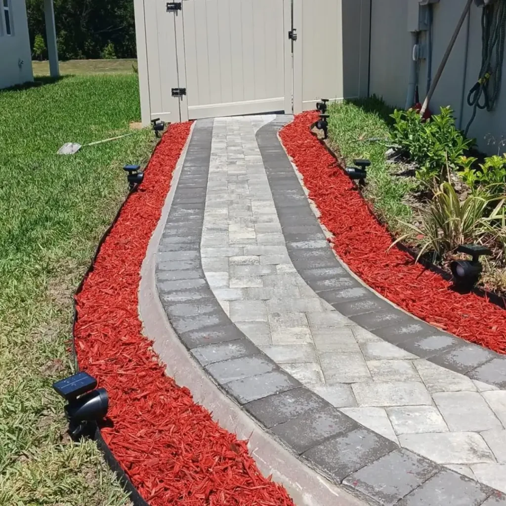 Brick paver patio sloped for water drainage